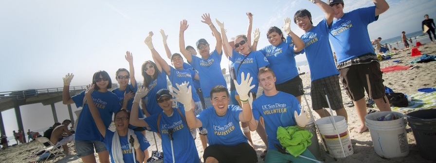 4 of 4, Students cheer at beach clean up